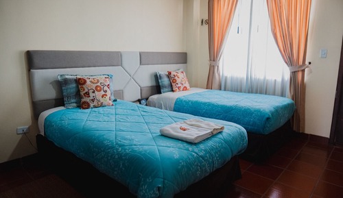 Habitación con 2 camas individuales