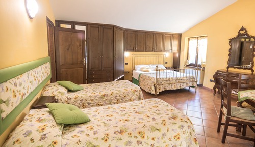 Habitación cuádruple familiar, 1 habitación, baño privado, vistas al jardín (La Ginestra)