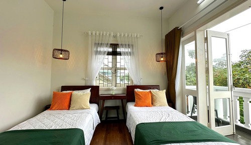 Habitación Deluxe con 2 camas individuales, balcón, vistas a la ciudad