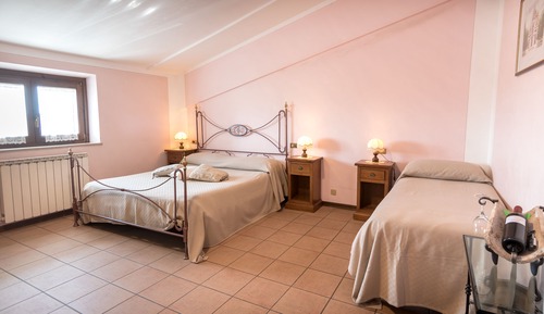 Habitación cuádruple Deluxe, vistas al jardín