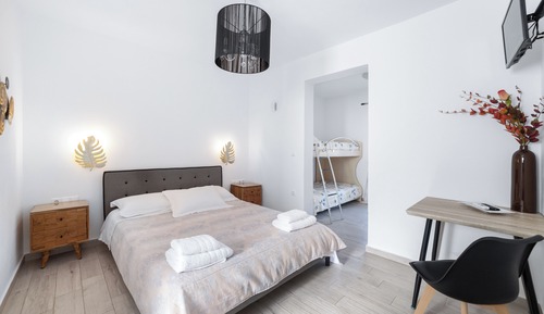 Apartamento familiar, 2 habitaciones, vistas al jardín, planta baja