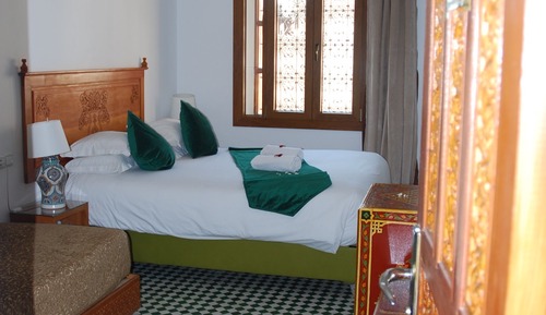 Habitación superior con 1 cama doble o 2 individuales
