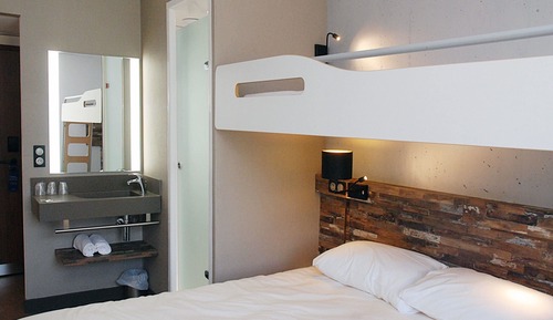 Habitación triple, varias camas