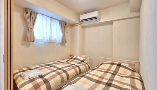 Habitación con 2 camas individuales