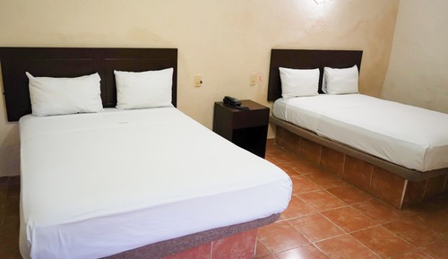 Habitación superior, varias camas
