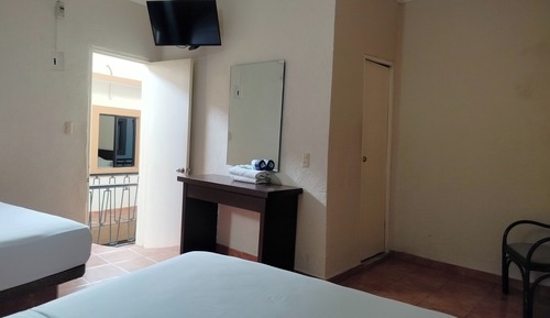 Habitación triple estándar, varias camas
