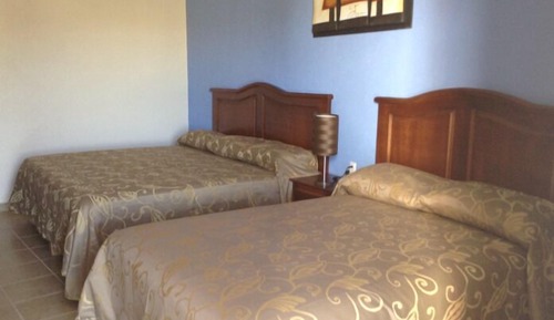 Habitación familiar, varias camas