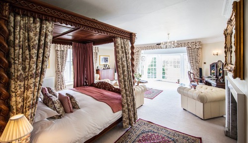 Suite presidencial, bañera, vistas al jardín