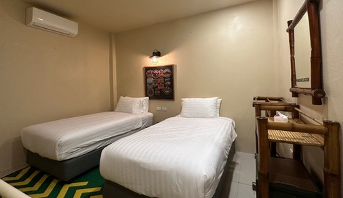Habitación superior con 2 camas individuales