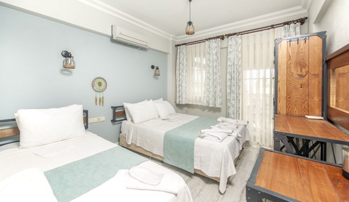 Habitación triple Deluxe, balcón, vistas al jardín