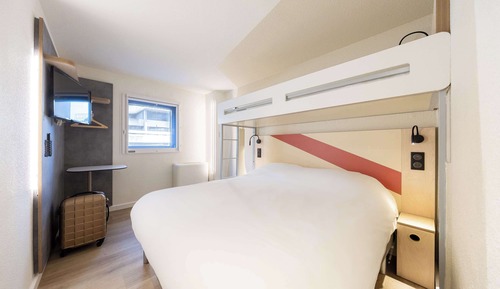 Habitación triple, varias camas