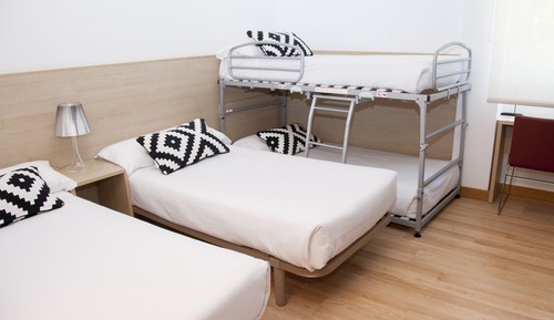 Habitación Cuádruple (2 Adultos + 2 Niños)