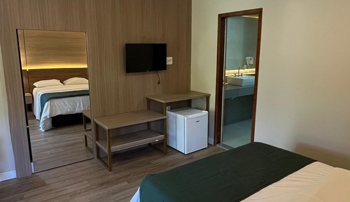 Quarto Duplo com Banheira Hidromassagem