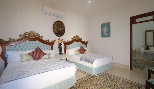 Habitación cuádruple Deluxe, 2 camas de matrimonio