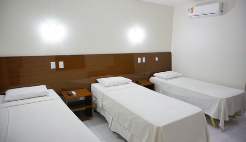Habitación triple de lujo, vistas al jardín