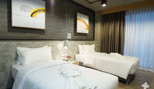 Habitación básica con 2 camas individuales