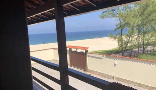 Habitación cuádruple Deluxe, varias camas, vistas parciales al mar