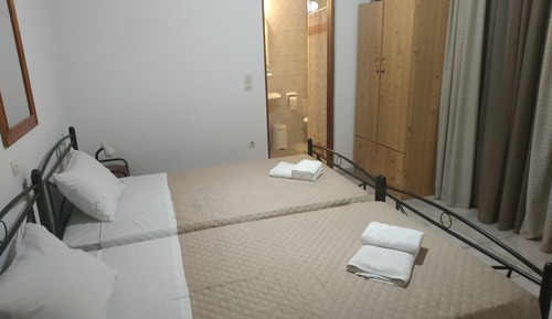 Habitación con 2 camas individuales, balcón, vistas al mar