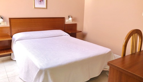 Habitación individual abuhardillada