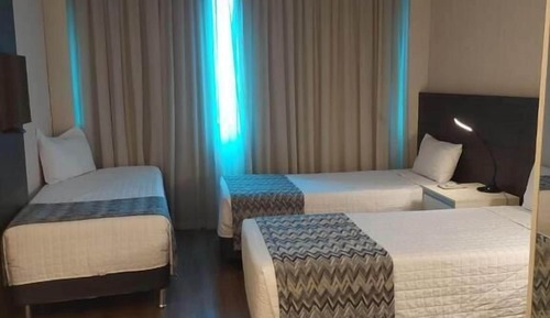 Habitación triple estándar, varias camas