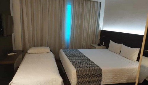 Habitación triple estándar, varias camas
