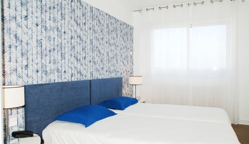 Habitación con 2 camas individuales, vistas al mar
