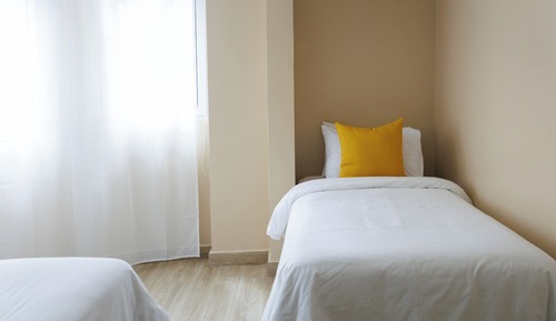 Habitación triple Deluxe, varias camas