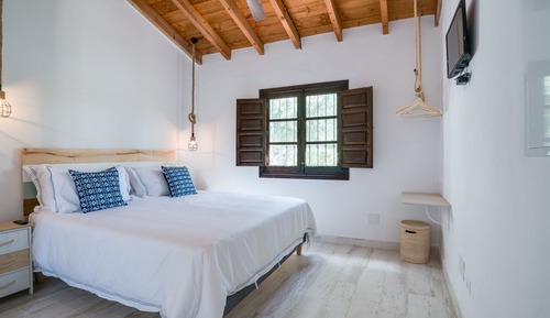 Habitación de lujo doble, 1 cama de matrimonio grande, vistas al jardín, en la zona del jardín