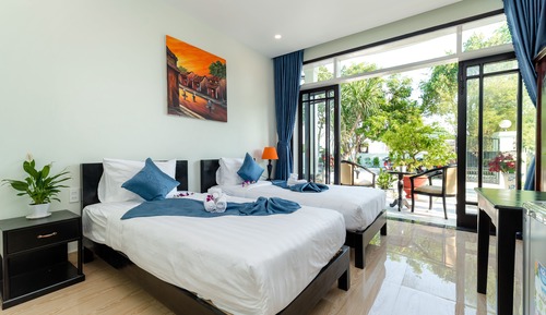 Habitación Deluxe con 1 cama doble o 2 individuales