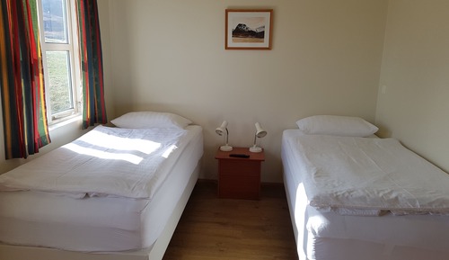 Habitación con 1 cama doble o 2 individuales, baño privado