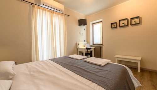 Habitación Confort con 1 cama doble o 2 individuales