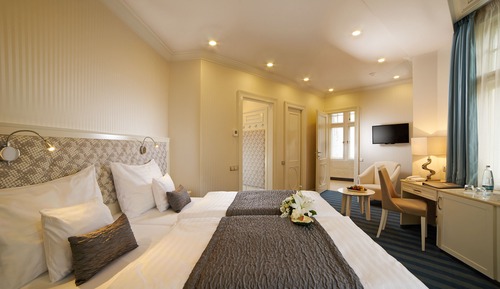 Habitación superior con 1 cama doble o 2 individuales