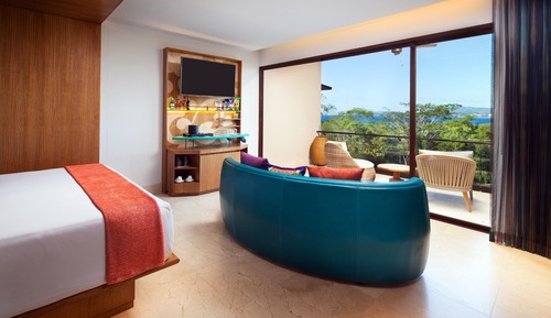Habitación Deluxe, 1 cama de matrimonio grande con sofá cama, vistas parciales al mar