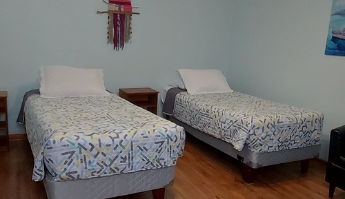 Habitación superior con 1 cama doble o 2 individuales