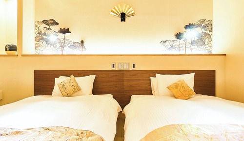 Habitación superior con 2 camas individuales, varias camas (Garden)