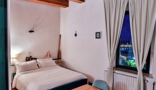 Habitación triple, vistas al mar