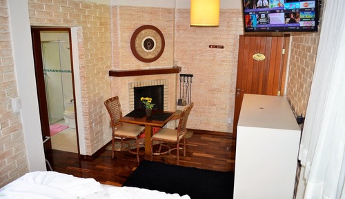 Suite Confort, 1 cama de matrimonio, bañera de hidromasaje, en la zona del jardín