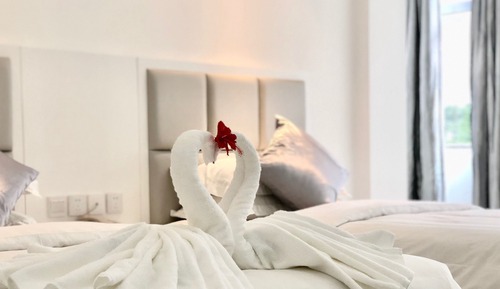 Habitación estándar con 1 cama doble o 2 individuales, vistas a la ciudad