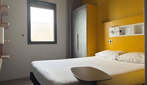 Habitación triple, varias camas