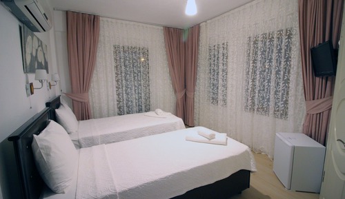 Habitación estándar con 1 cama doble o 2 individuales
