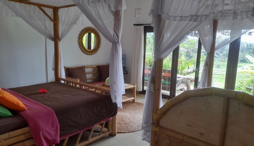Habitación triple Deluxe, vistas a la montaña, en la zona del jardín