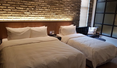 Habitación Deluxe con 2 camas individuales (No Breakfast on Every Monday)