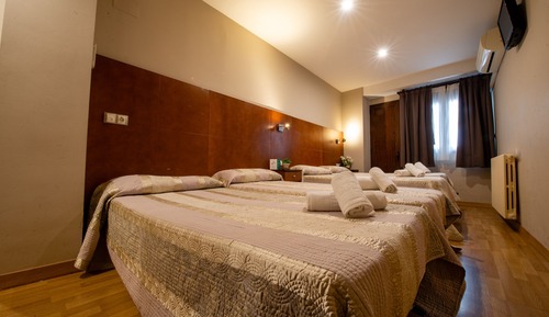 Habitación Doble con 2 Camas Supletorias