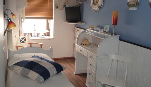 Habitación individual, 1 cama individual, vistas a la ciudad, en una planta alta