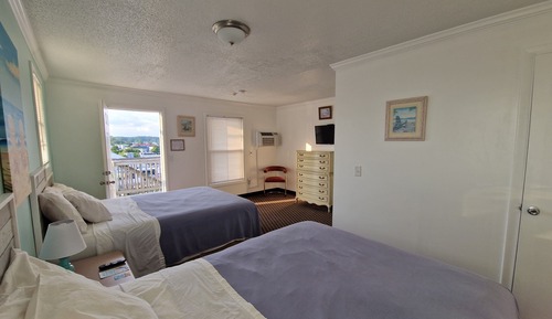 Habitación doble, 2 camas de matrimonio, vistas parciales al mar, en esquina