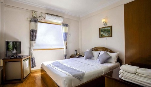 Habitación superior con 1 cama doble o 2 individuales
