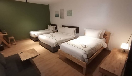 Habitación cuádruple Deluxe