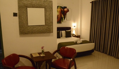 Habitación triple Deluxe, varias camas