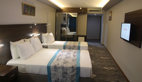 Habitación triple Deluxe