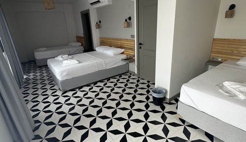 Habitación cuádruple familiar, balcón, vistas al jardín